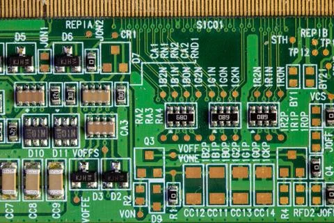 Green computer board with different electronics elements. texture Stock Photos