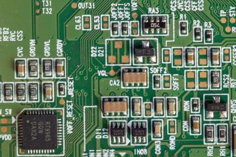 Green computer board with different electronics elements. texture Stock Photos