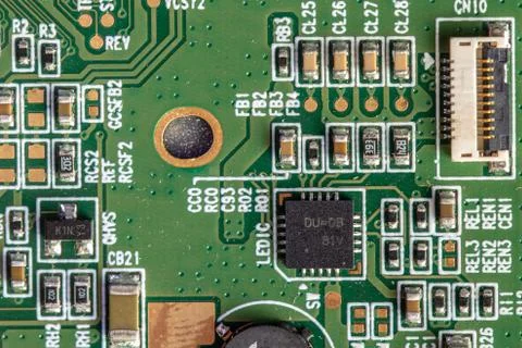Green computer board with different electronics elements. texture Stock Photos