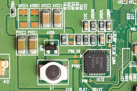 Green computer board with different electronics elements. texture Stock Photos