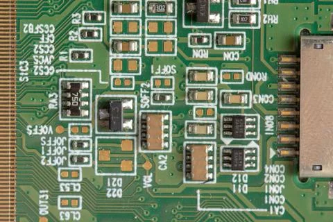 Green computer board with different electronics elements. texture Stock Photos