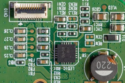 Green computer board with different electronics elements. texture Stock Photos