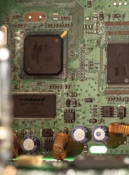 Green computer board with different electronics elements. texture Stock Photos