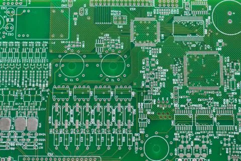 A green computer circuit board background. Stock Photos
