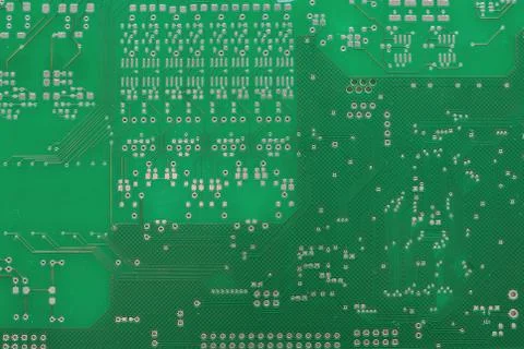 A green computer circuit board background. Stock Photos