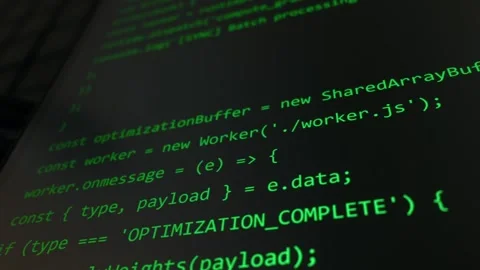 Green Computer Code Script Displayed on Dark Digital Screen Terminal 库存影片 334728135