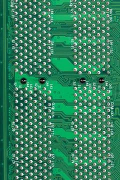 Green Computer motherboard surface of technology background. Stock Photos