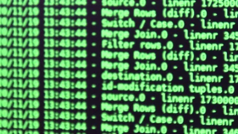 Green computer software code moving on a black monitor reflect on glass defoc Stock Footage 143672758