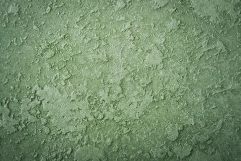 Green concrete wall background texture. Old green background in grunge style. Stock Photos