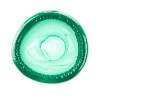 Green condom Stock Photos