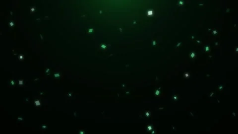 Green confetti on an black background Stock Footage 258360825