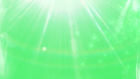 Green confetti explosion with sparkling light rays Video stock 338217432