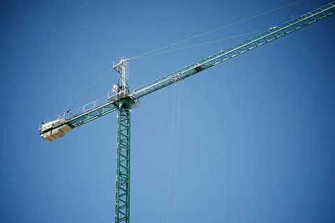 Green construction crane Stock Photos