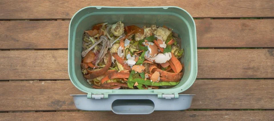 Green container with compost in it Stock Photos