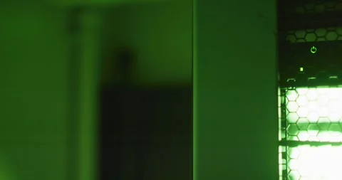 Green control lights with data processing on computer servers in tech room Stockbeeldmateriaal 335364171