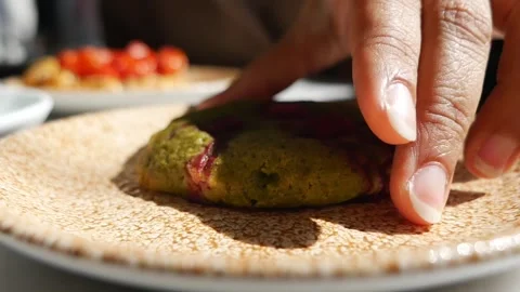 Green cookie with fruit on a plate at a cafe Stock Footage 342213755