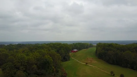 Green Countryside on Cloudy Day Stock Footage 123981353