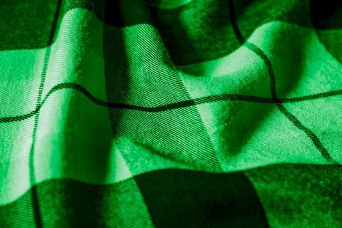 Green crinkled material with an interesting pattern Stock Photos