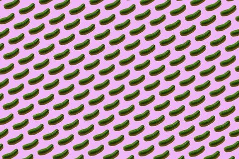 Green cucumber pattern on light pink background pop art design Stock Illustration