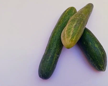 Green cucumber on a white background Foto stock