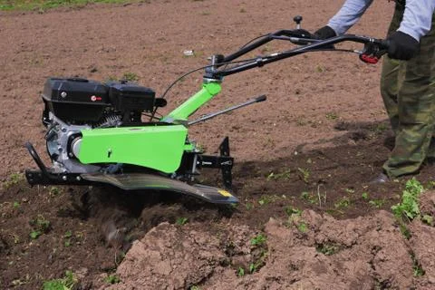 Green cultivator machine Stock Photos
