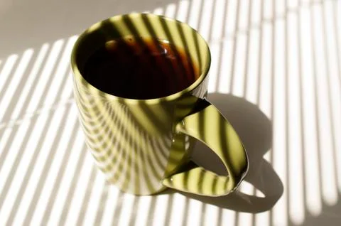Green cup with coffee Stock Photos