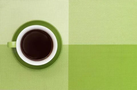 Green cup of coffee Stock Photos