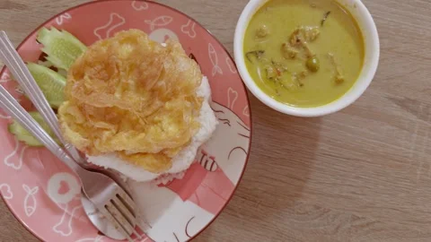 Green curry with omelet Stock Footage 258290326