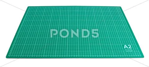Green Cutting mat isolated on white Stock Photos