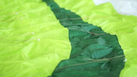 Green deflated parachute Stock Footage 77812089
