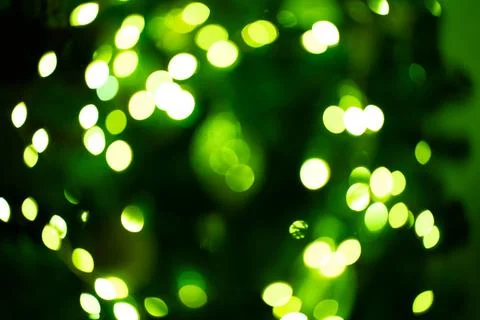 Green defocused lights, background or texture. Stock Illustration