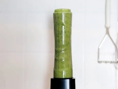 Green detox smoothie blending Stock Footage 72378283