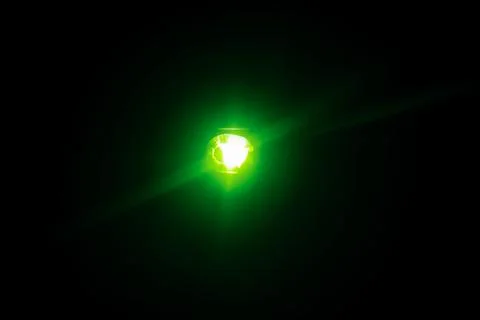 Green diamond on black background 스톡 사진