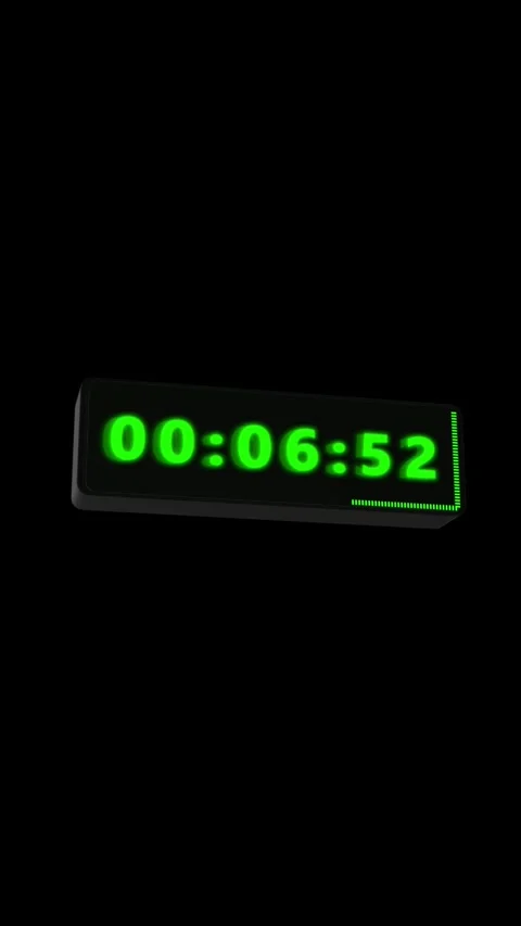 Green digital countdown timer glowing clock display, black isolated space, and f Stock Footage 340527886