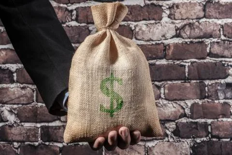 Green Dollar In Hand Stock Photos
