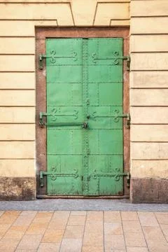 Green door with lock Stock Photos