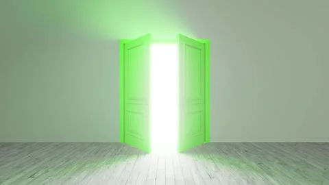 Green door opening to bright light in empty room Stock Footage 310791678