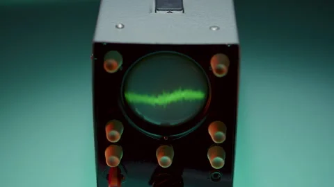 Green Dot Changing into Fluctuating Waveform on Oscilloscope Screen Stock Footage 291944815