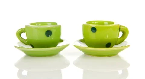 Green dotted tableware cups Foto stock