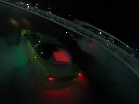 Green drift car at night 動画素材 184086017