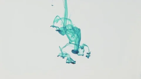 Green drop of ink in water Stock Footage 84756326
