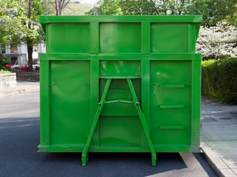 Green dumpster Stock Photos