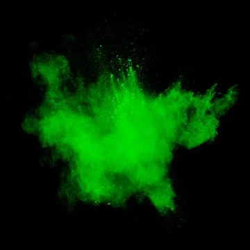 Green dust explosion on black background. Colored powder splatter on backgr.. Stock Photos