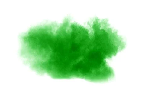 Green dust particles explosion on white background. Color powder dust splash. Stock Photos