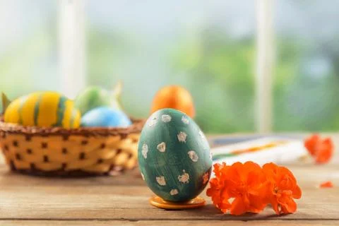 Green Easter egg and flower Stock Photos