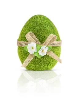 Green Easter egg decorated with bow and flowers isolated on white. Foto stock