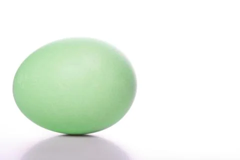 Green easter egg on white background Stock Photos