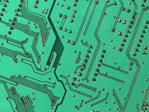 Green electronic microcircuit. Stock Photos