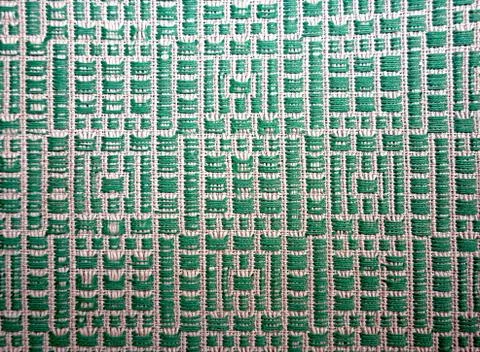 Green embroidered pattern Stock Photos