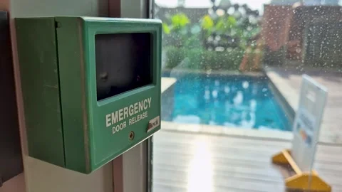 Green emergency door release button box Stock Footage 338310294